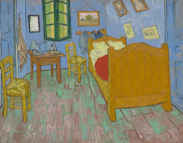 A bedroom with blue walls, a green window, a tan bed, and red bedding.